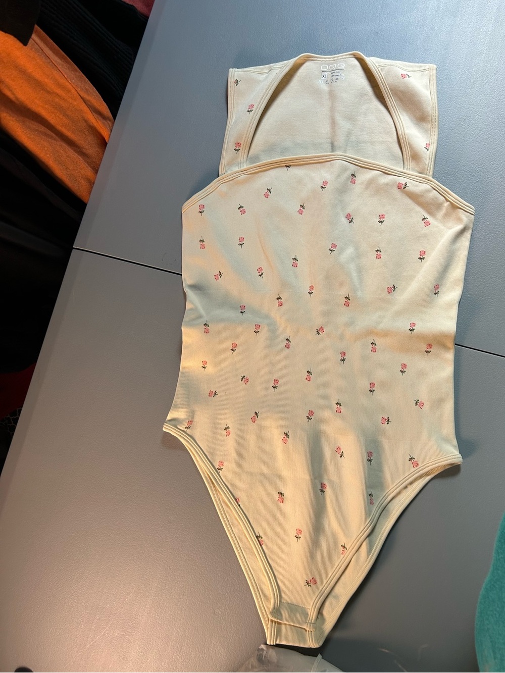Cream One-Piece Bodysuit with Pink Floral Print